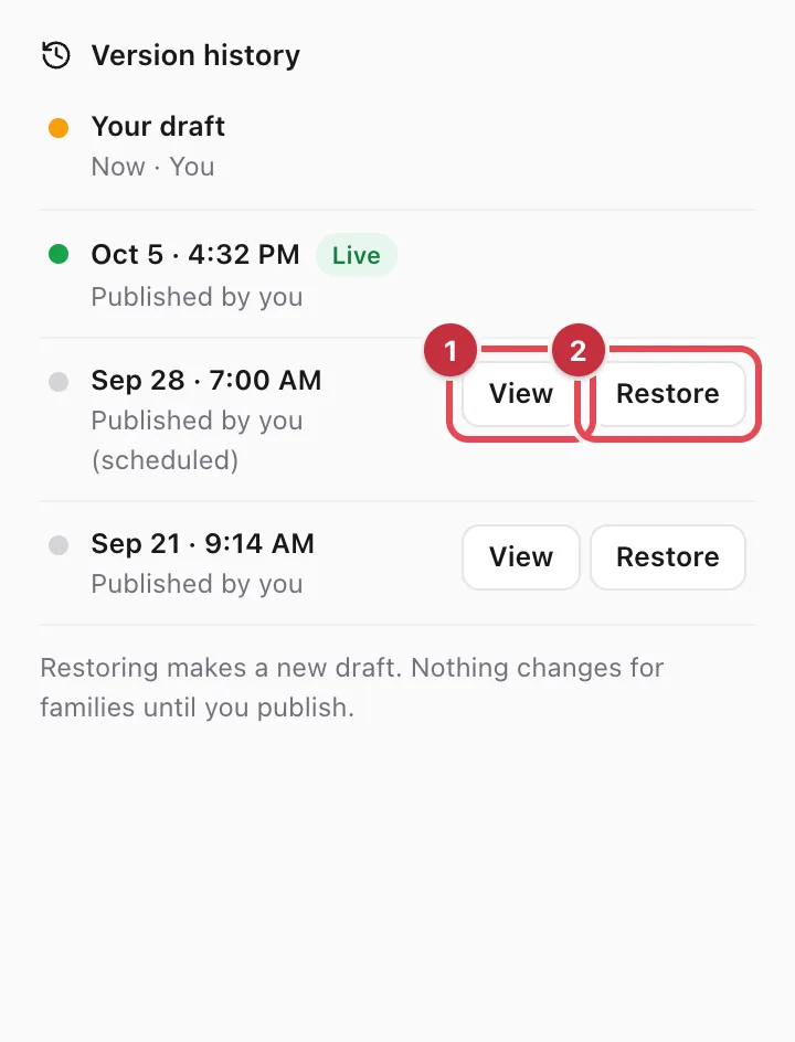 The Version history list, with View and Restore highlighted on an older version